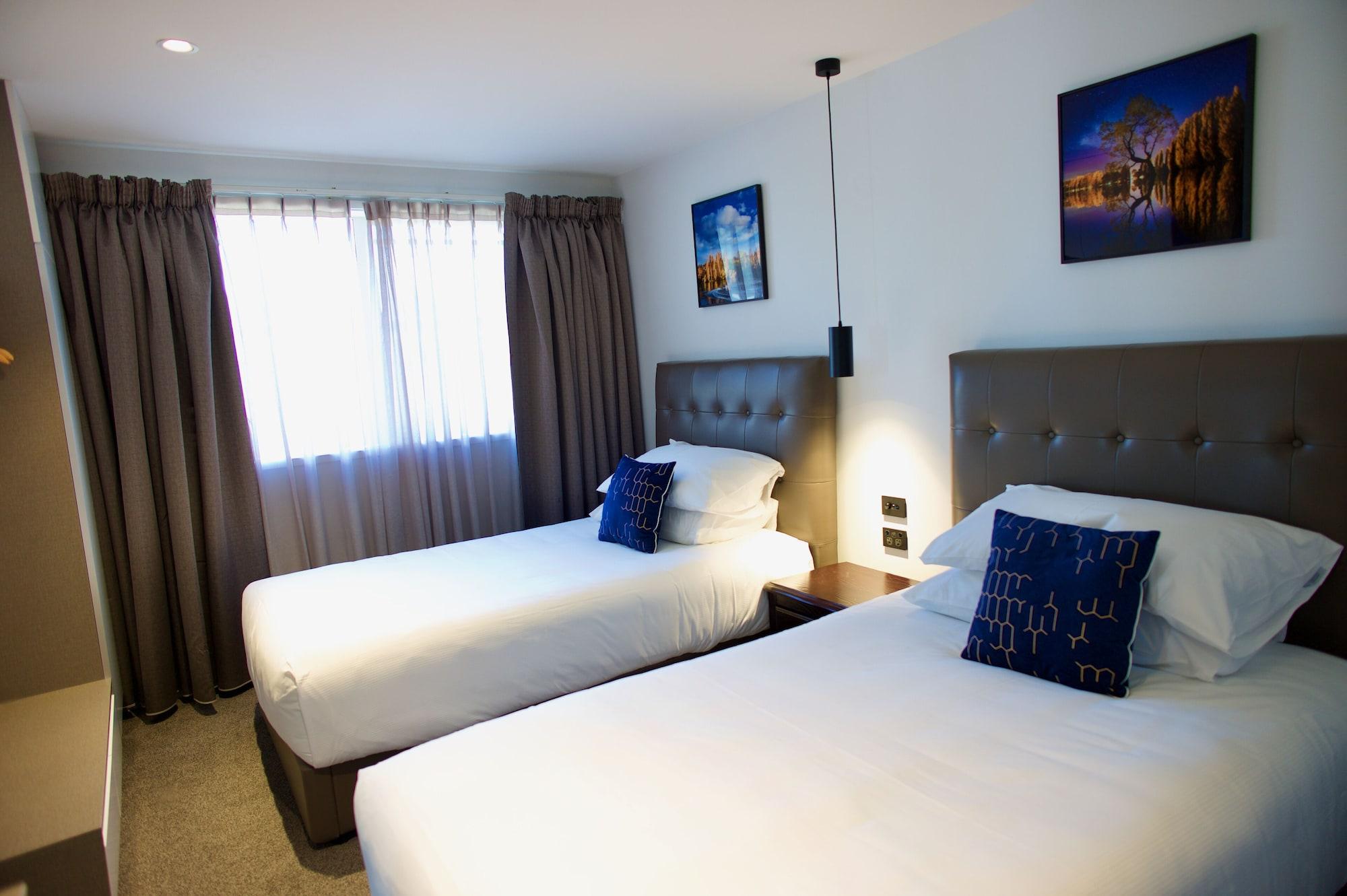 רוטורואה Regal Palms Resort מראה חיצוני תמונה A typical bedroom at the hotel
